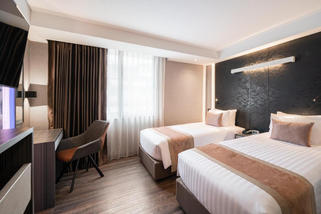 Aspira Gems Center Silom Hotel Банкок Стая снимка