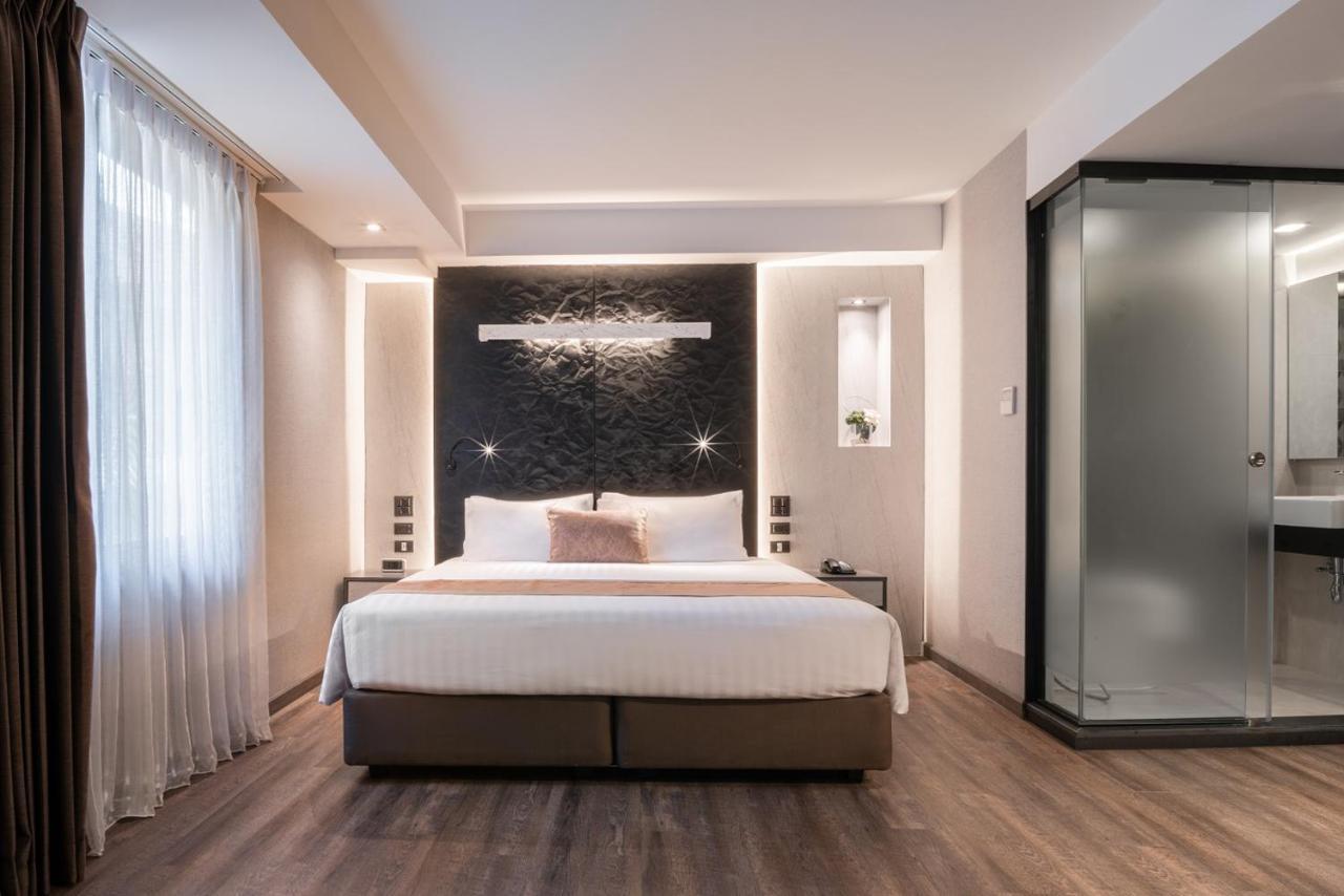 Aspira Gems Center Silom Hotel Банкок Стая снимка